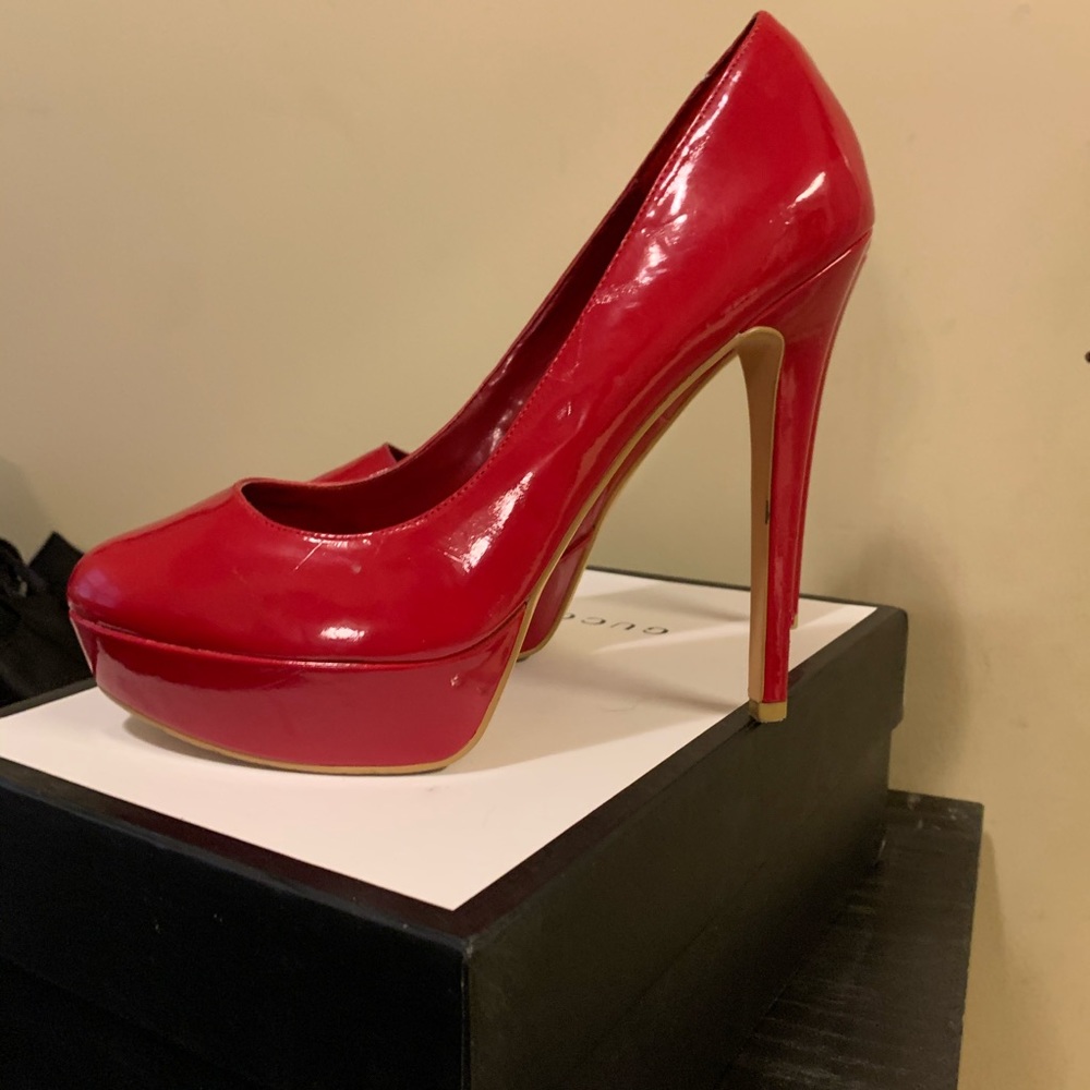 Red high heel platform shoes